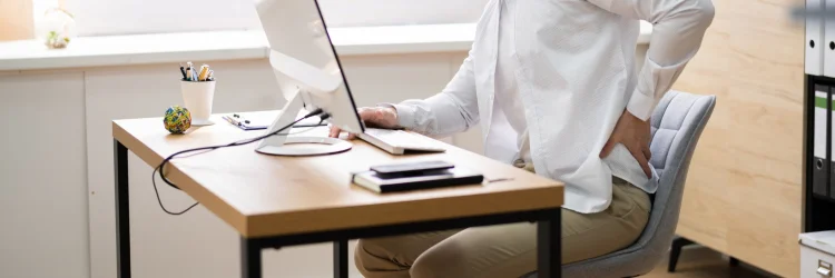 back pain from sitting Treatment In Lansing